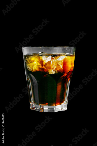 Summer cocktail on isolated black background