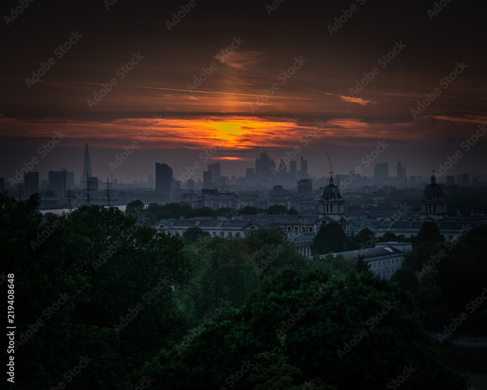 Sunset over London sky line from Greenwich park