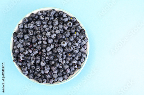 Lot of ripe blue blueberries in bowl