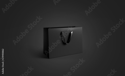 Obraz na plátne Blank black paper bag with silk handle mockup, isolated, pd rendering