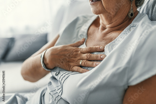 Female with chest pain photo