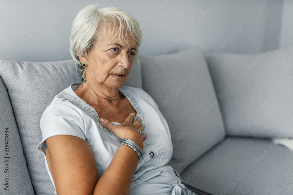 Heart attack concept. Woman suffering from chest pain, Health care Heart attack concept. Woman suffering from chest pain, Health care