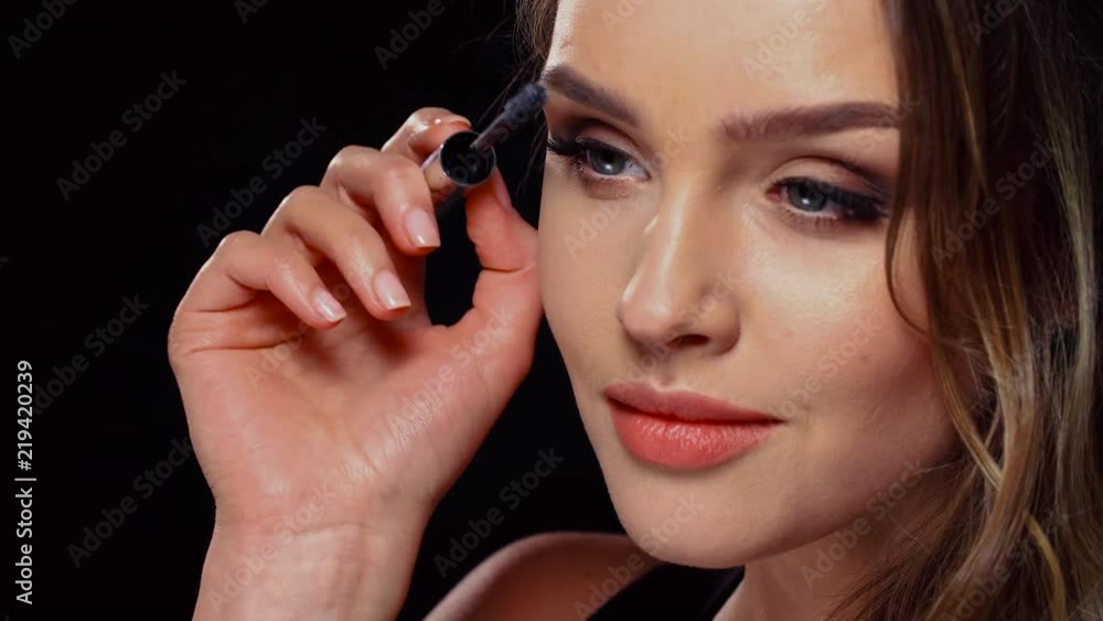 Eye Makeup. Beautiful Woman Applying Mascara On Lashes Eye Makeup. Beautiful Woman Applying Mascara On Lashes