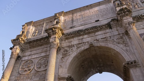 Rome, Italy - Circa July 2018. Stabilized 4K slow motion shot of Arch of Constantine, next to Colosseum. photo