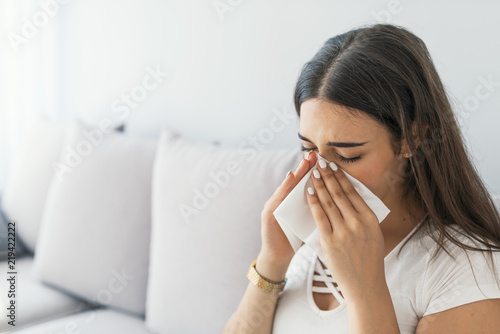Sick desperate woman has flu. Rhinitis, cold, sickness, allergy concept. © Dragana Gordic