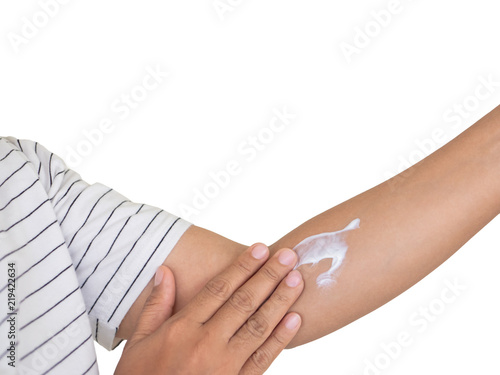 woman apply lotion to skin,with clipping path.
