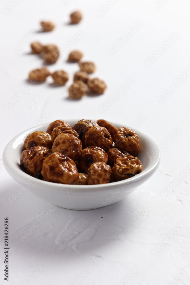 Soaked tiger nuts, used to make traditional Valencian horchata, closeup Soaked tiger nuts, used to make traditional Valencian horchata, closeup