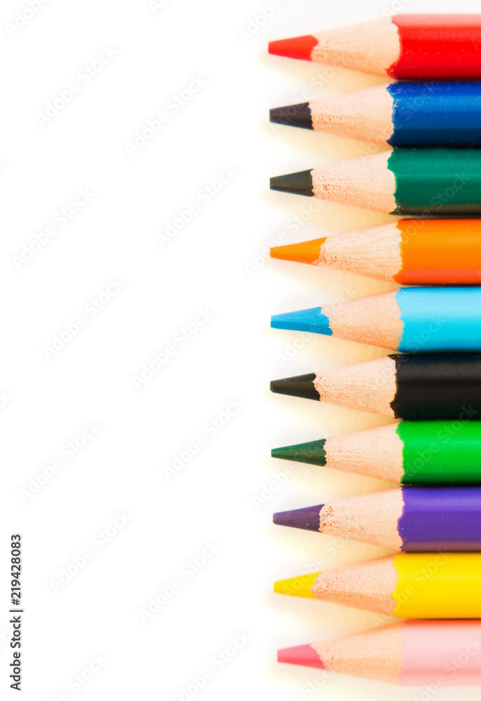 Color pencils in row isolated on white background. Color pencils in row isolated on white background.