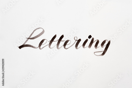 word lettering on white background. watercolor brush calligraphy and creative handwriting. art hobby and leisure.
