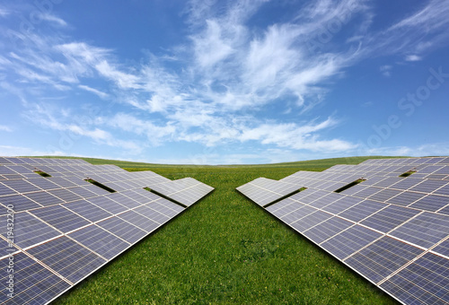 Huge solar panels generate electricity on vast grasslands