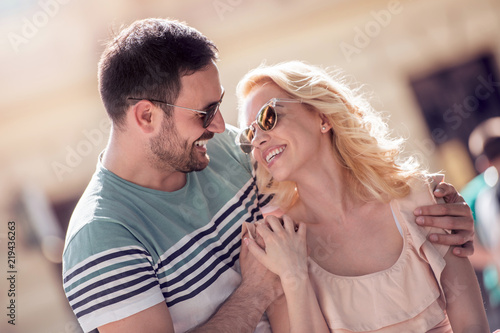 Portrait of beautiful young couple outside