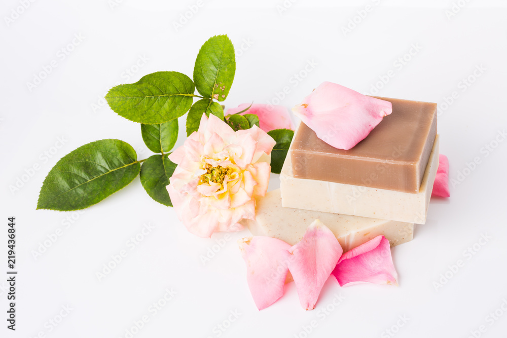 Handmade soap with flower petals on white background Handmade soap with flower petals on white background