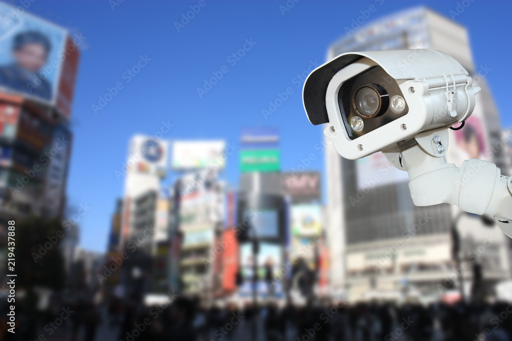 security CCTV camera or surveillance system with traveler tokyo on blurry background.