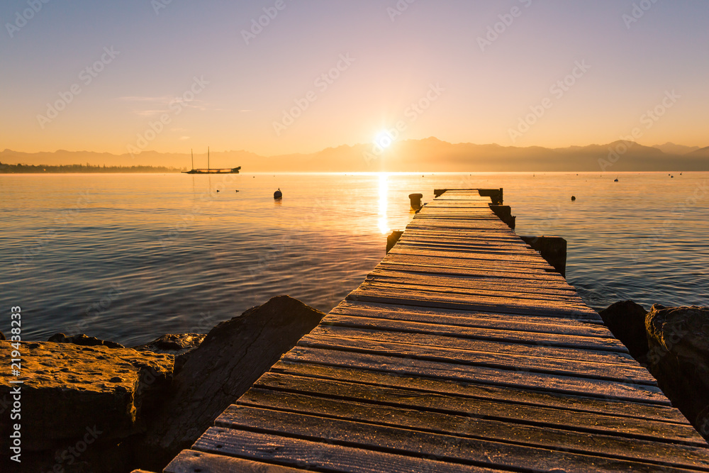 Sunrise over Frozen Wood Pier, Leman Lake and Iconic Snowy Mont-Blanc