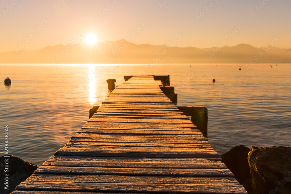 Sunrise over Frozen Wood Pier, Leman Lake and Iconic Snowy Mont-Blanc.