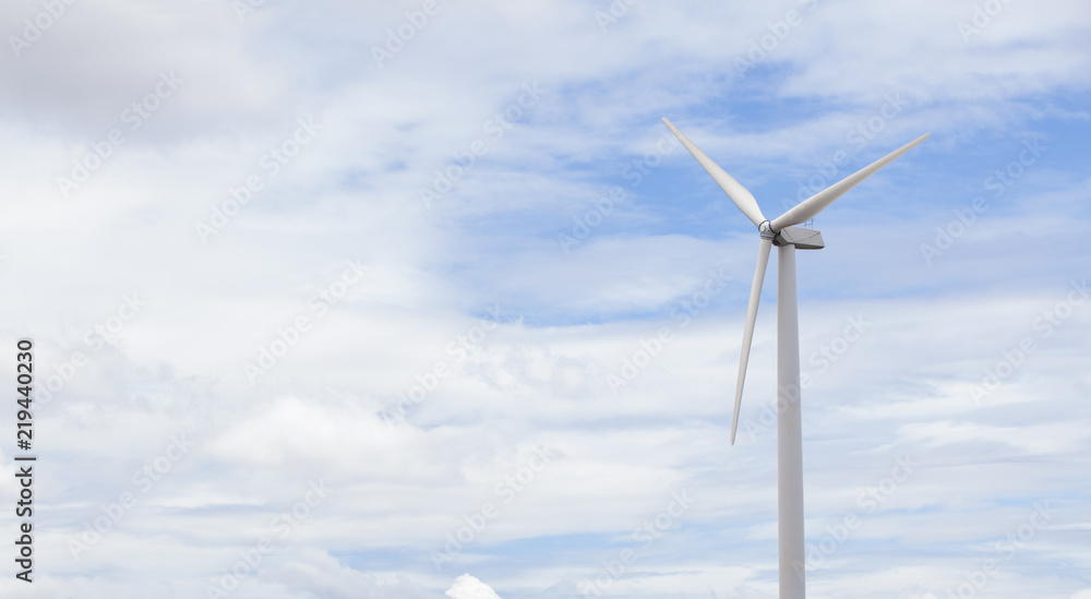 Electric Turbine Windmill on a blue sky. Closeup image of turbines blades.