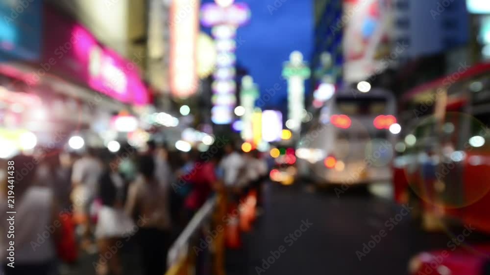 Yaowarat street atmosphere,blurred for background. Defocused cityscape of bangkok china town at night full of tourists and traffic with light bokeh and lens flare effect. Yaowarat street atmosphere,blurred for background. Defocused cityscape of bangkok china town at night full of tourists and traffic with light bokeh and lens flare effect.