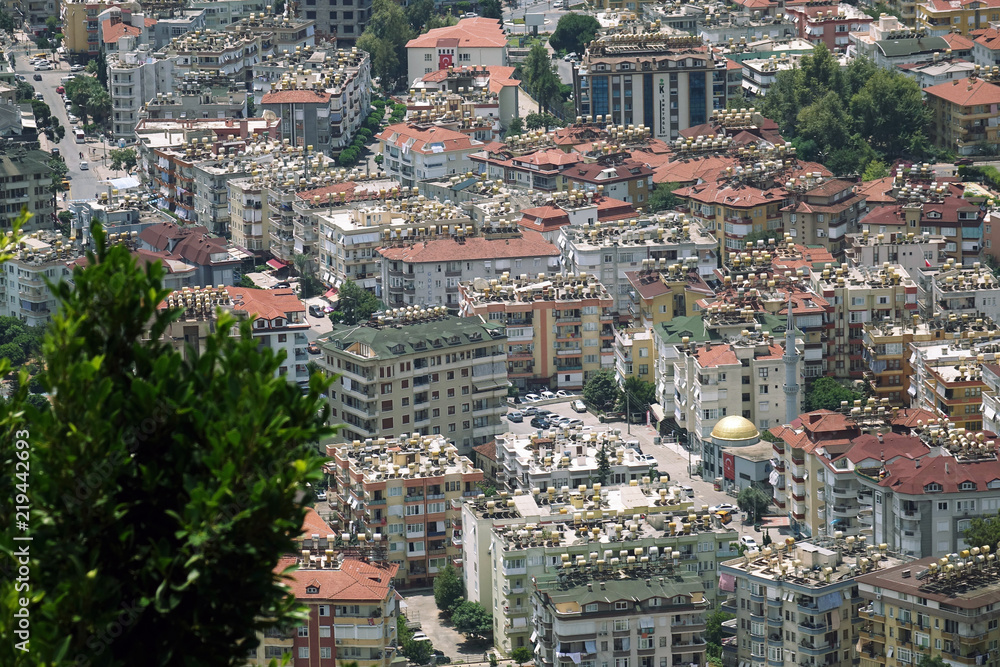 Panorama of the city. Numerous houses of the coastal city. The view from the height of bird flight.