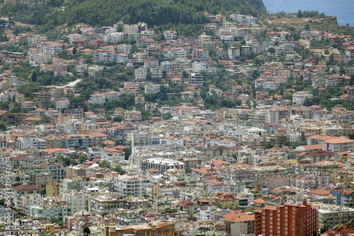 Panorama of the city. Numerous houses of the coastal city. The view from the height of bird flight.