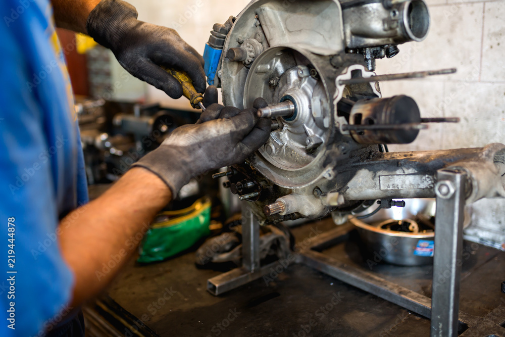 Motorcycle Mechanic at Work Motorcycle Mechanic at Work