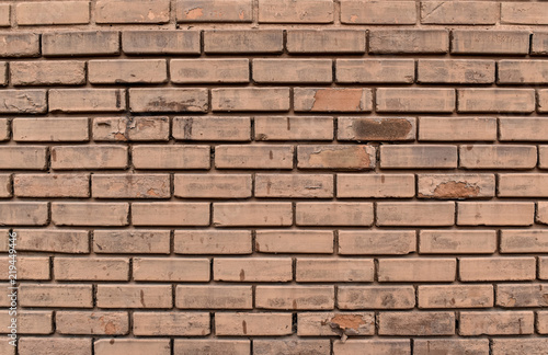 Old vintage brick wall textured or background.