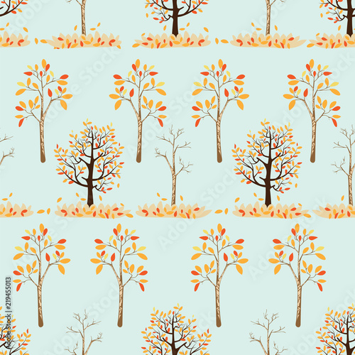 Seamless pattern of autumn trees with leaves falling in green background