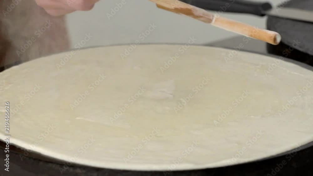 Preparation of pancakes for carnival in slow motion Preparation of pancakes for carnival in slow motion