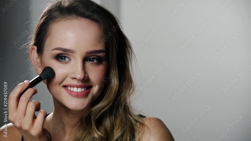 Woman With Beauty Face Applying Makeup Blush With Brush Woman With Beauty Face Applying Makeup Blush With Brush