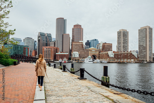 Girl in Harborwalk, Seaport, Boston, Massachusetts, USA.