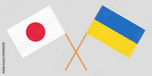 Crossed Ukraine and Japan flags. Official colors. Correct proportion. Vector