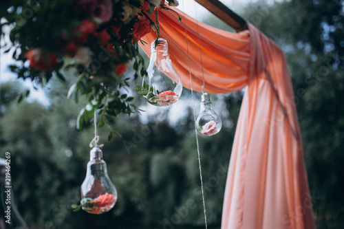 beautiful wedding decor with flowers and wood