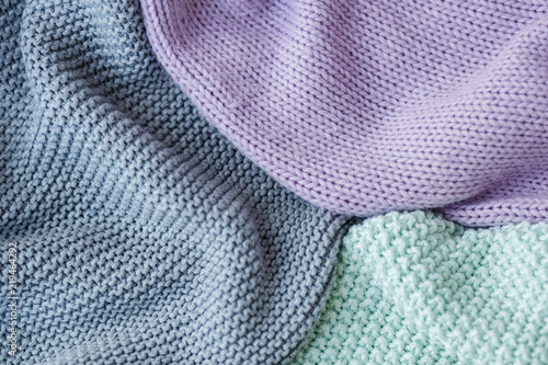 Gray, mint and lilac knitting wool texture background. Copy space