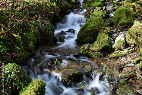 Long exposure of the river at Tarr steps in Devon photo