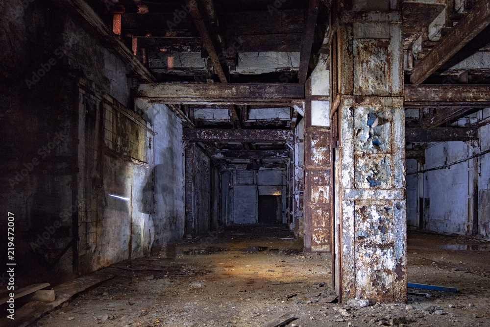 Dark and creepy interior of abandoned factory