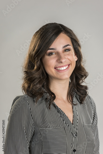 Beautiful Young Lady on Gray Background