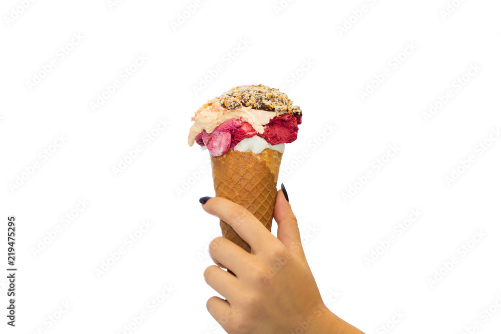 Ice cream cone isolated. The woman holding the ice cream by hand. Ice cream cone isolated. The woman holding the ice cream by hand.