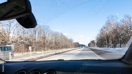 view of M1 highway in Russia trough windshield photo