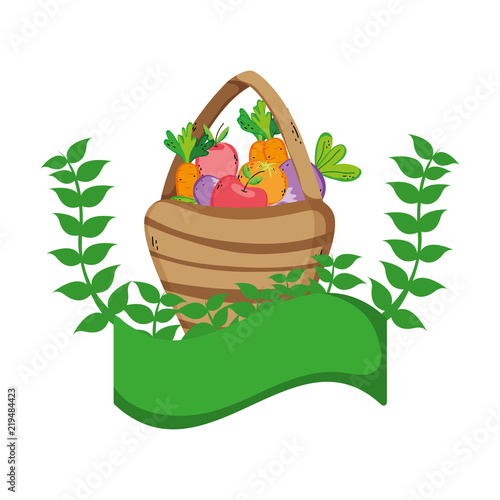 fruits and vegetables inside hamper and plant branches