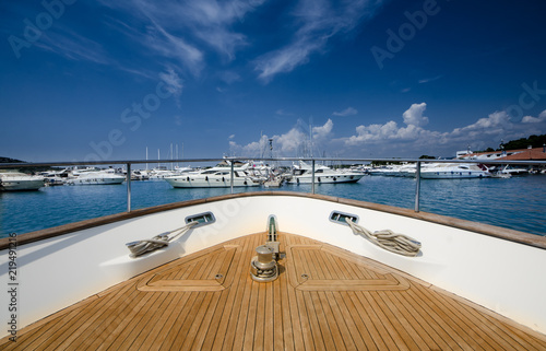Wide angle shot of front of the yacht in martina on clear summer day © photogoricki