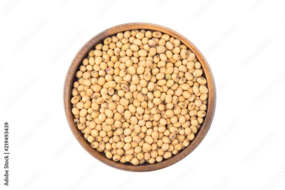 Soybeans in a wooden bowl isolated on white background. Soybeans in a wooden bowl isolated on white background.