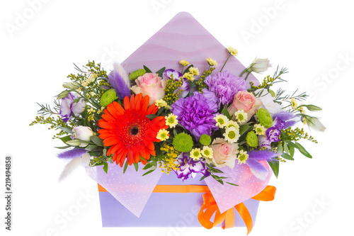 Bright buketny composition from fresh flowers, the white isolated background photo