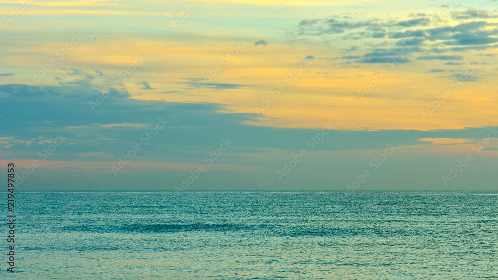 Sea waves and beautiful sunset