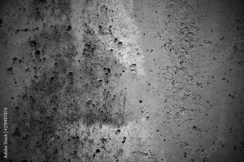 Abstract dark grunge concrete texture for background with black vignette