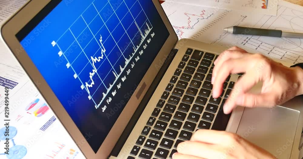 Businessman operating computer on the tablet with diagrams,change finance market trend data chart on computer,business analysis report document on table,corporate Profit report,Financial figures Businessman operating computer on the tablet with diagrams,change finance market trend data chart on computer,business analysis report document on table,corporate Profit report,Financial figures