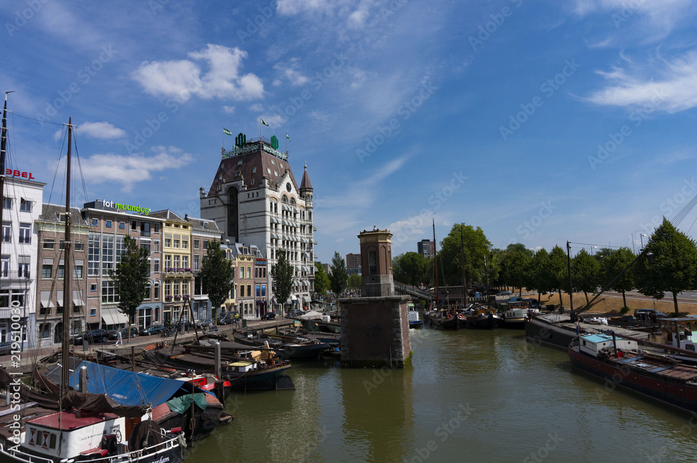 Rotterdam, Netherlands - June 3, 2018: Art nouveau style white house with view at old harbour