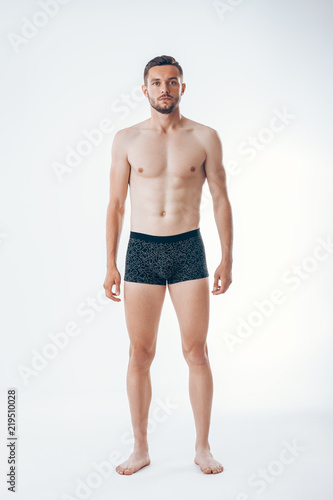 Fotografija Full length portrait of a young sexy muscular male model in underwear