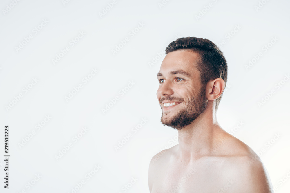 Closeup portrait of young man with health clean skin Closeup portrait of young man with health clean skin