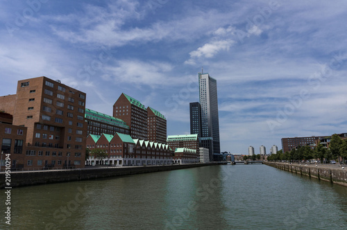 Modern architecture downtown in d 'Kop van Zuid' neighbourhood in Rotterdam photo