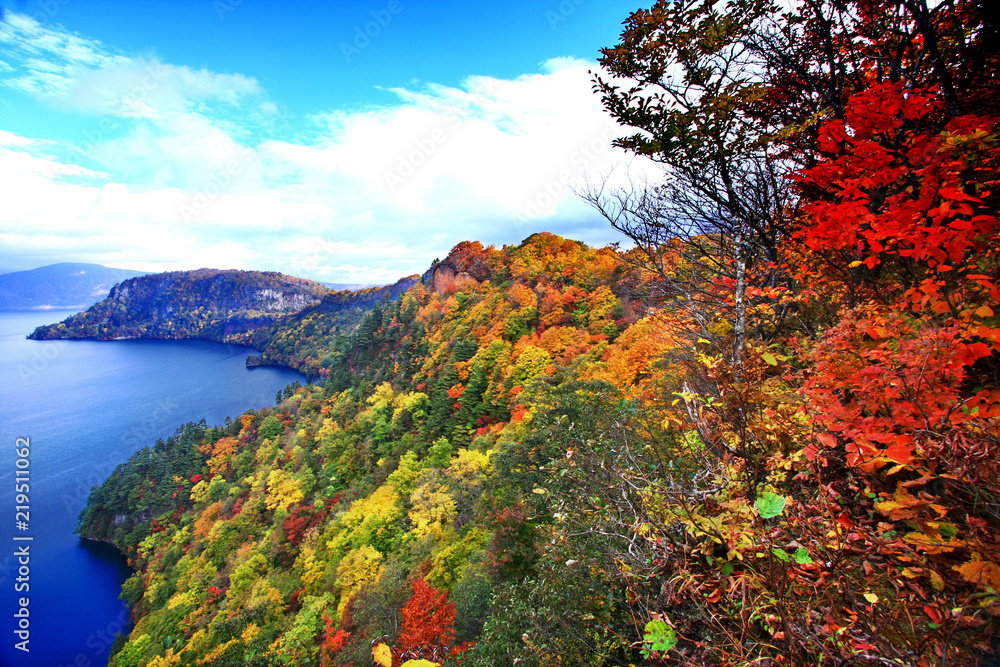 Beautiful aerial view of Lake Towada with colorful autumn foliage in Aomori, Japan, seen from Kankodai observation deck