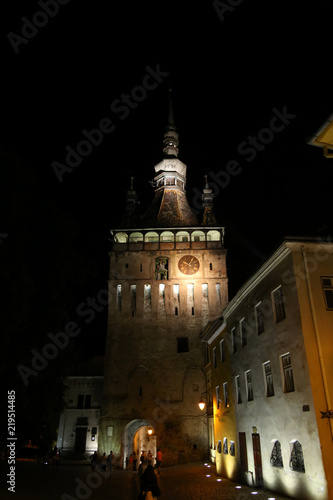 Night scene with the tower clock of the medieval town of Sighisoara